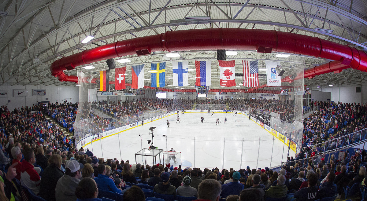 USA Hockey rink with country's flags in front 